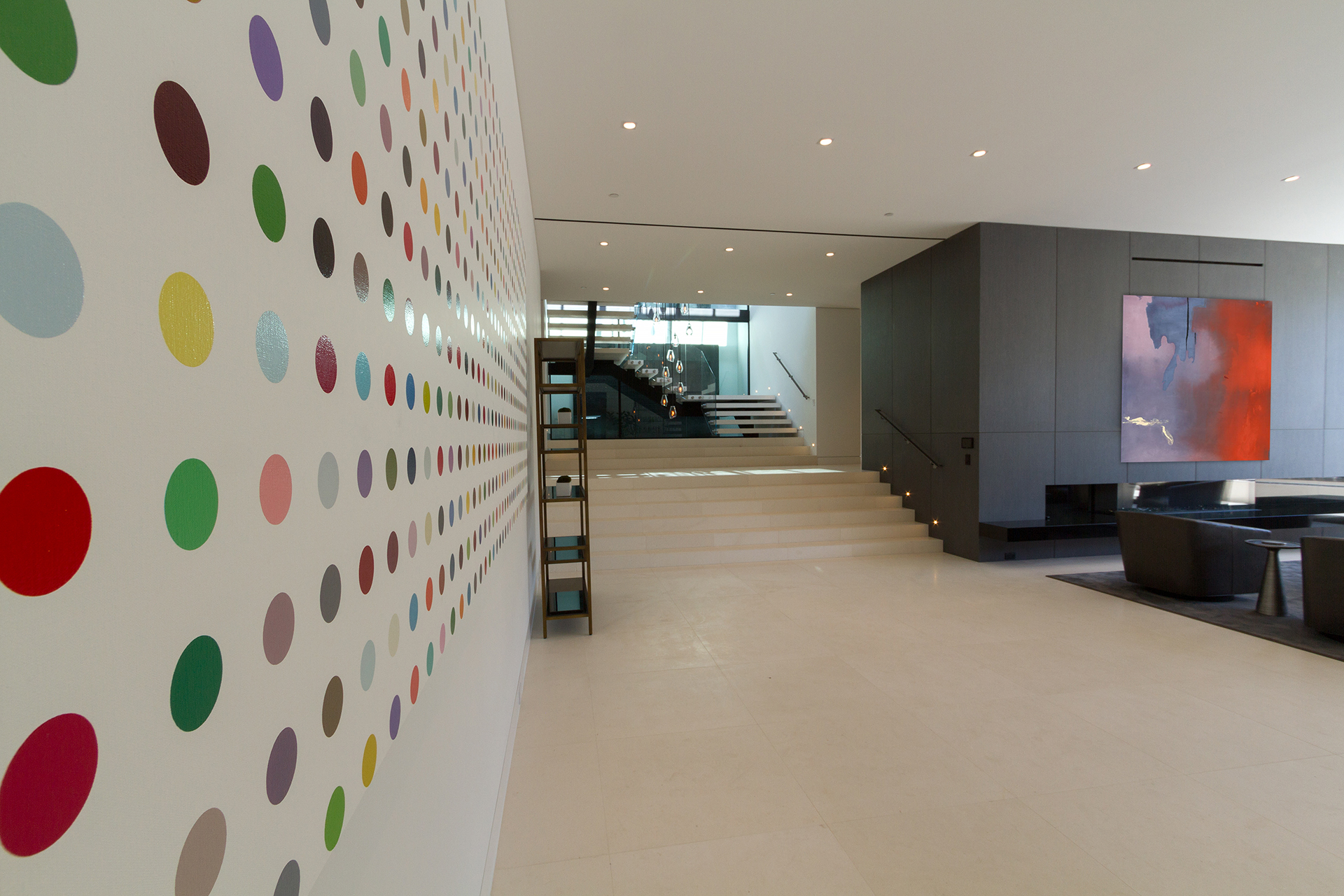 Gallery hallway with dot artwork