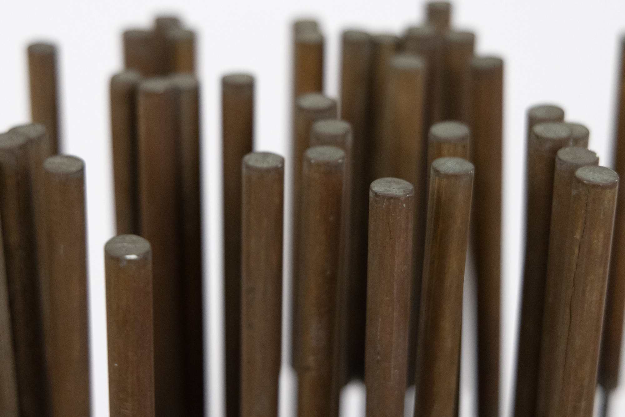 <div><font face=Calibri size=3 color=black>Harry Bertoia’s “Sonambient” sculptures are a mesmerizing blend of art, sound, and science, and this 36-tine piece is a quintessential example of his innovative genius. Meticulously crafted with 36 rods aligned in a precise six-by-six configuration on a square base, this 77-inch-tall work embodies the harmonious intersection of visual beauty and auditory wonder.</font></div>
<br>
<br><div> </div>
<br>
<br><div><font face=Calibri size=3 color=black>Made from beryllium copper, a material favored by Bertoia for its superior acoustic properties and aesthetic appeal, the rods have developed a rich walnut-like patina over time. This patina adds to the sculpture’s visual allure, enhancing its historical and artistic value, and reflects a natural aging process that the artist himself, a naturalist, would have admired. When activated by touch or the movement of air, the rods produce a perceptible, fixed note accompanied by a range of ethereal tones, transforming the sculpture from a static object into a dynamic, multisensory experience. The long, swaying motion of the tall rods, reminiscent of the undulating desert grasses that inspired the artist initially, adds a captivating visual dimension. The cattail-like finials further evoke natural forms, underscoring Bertoia’s inspiration derived from the natural world.</font></div>
<br>
<br><div> </div>
<br>
<br><div><font face=Calibri size=3 color=black>Bertoia’s 36-tine “Sonambient” sculpture is more than a visual masterpiece; it profoundly explores sound, material, and participatory interaction. It exemplifies Bertoia’s belief in art as an immersive and evolving experience, where each encounter offers discoveries and sensations. Through this work, Bertoia has created a timeless piece that continues to captivate and inspire, highlighting his artistic vision's enduring power and deep connection to nature’s spiritual qualities.</font></div>